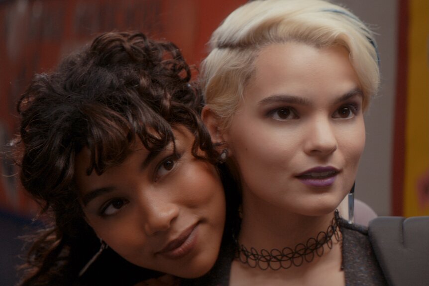 McKayla Hooper (Alexandra Shipp) rests her head on Sadie Cunningham's (Brianna Hildebrand) shoulder in&nbsp;Tragedy Girls (2017).