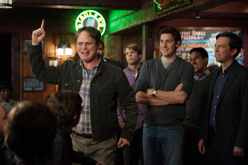 Dwight Schrute, Pete, Jim Halpert, and Andy Bernard standing together on The Office Season 9 Episode 25.