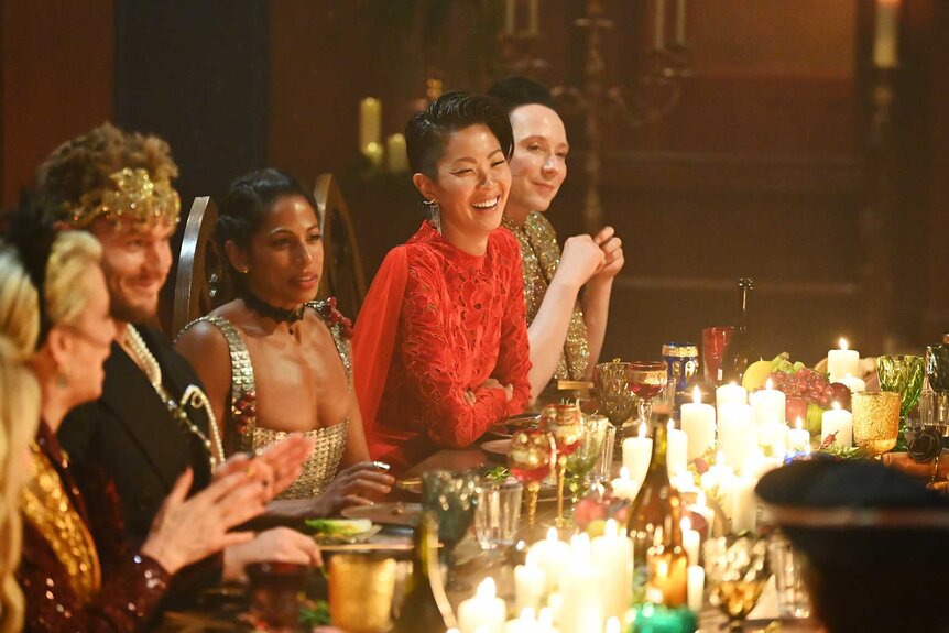 Colton Underwood, Natalie Anderson, Kristen Kish, and Johnny Wei sitting at a table on The Traitors Season 4 Episode 8.