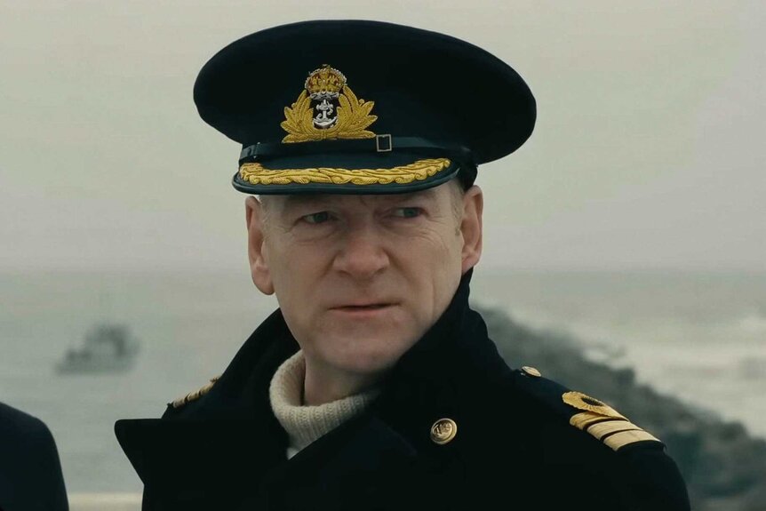 A man with a concerned look in Dunkirk (2017).