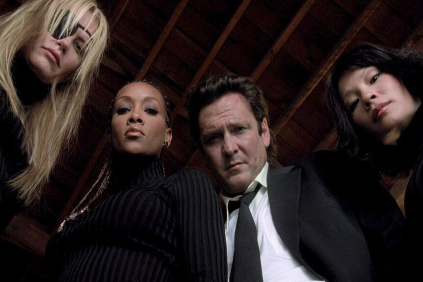 Daryl Hannah, Vivica A. Fox, Michael Madsen, and Lucy Liu looking down together in Kill Bill: The Whole Bloody Affair (2004).