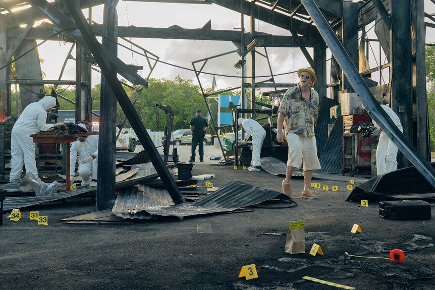 Kincaid walking through a crime scene in M.I.A. Season 1 Episode 2.