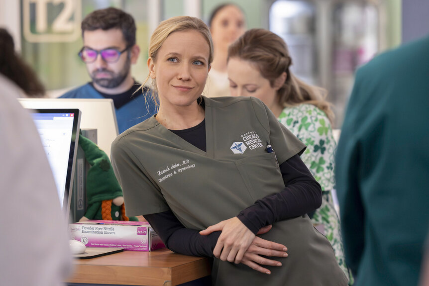 Dr. Hannah Asher (Jessy Schram) looking onward on Chicago Med Season 11 Episode 13.