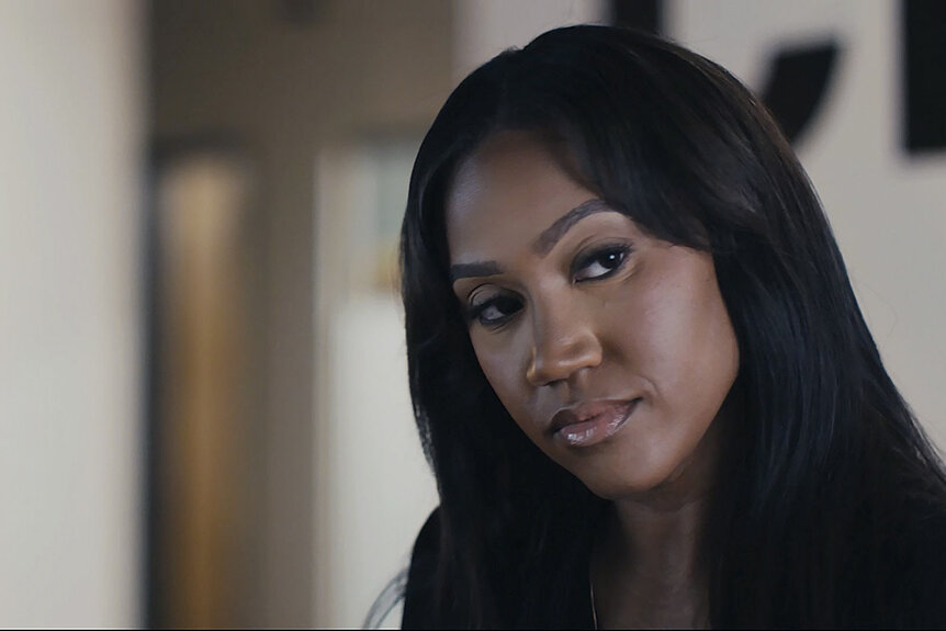 Sydney Mitchell looking onward in Another Man's Wife (2026).