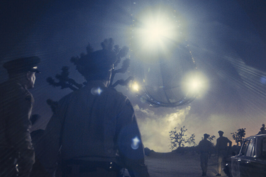 People looking at the sky in Disclosure Day (2026).