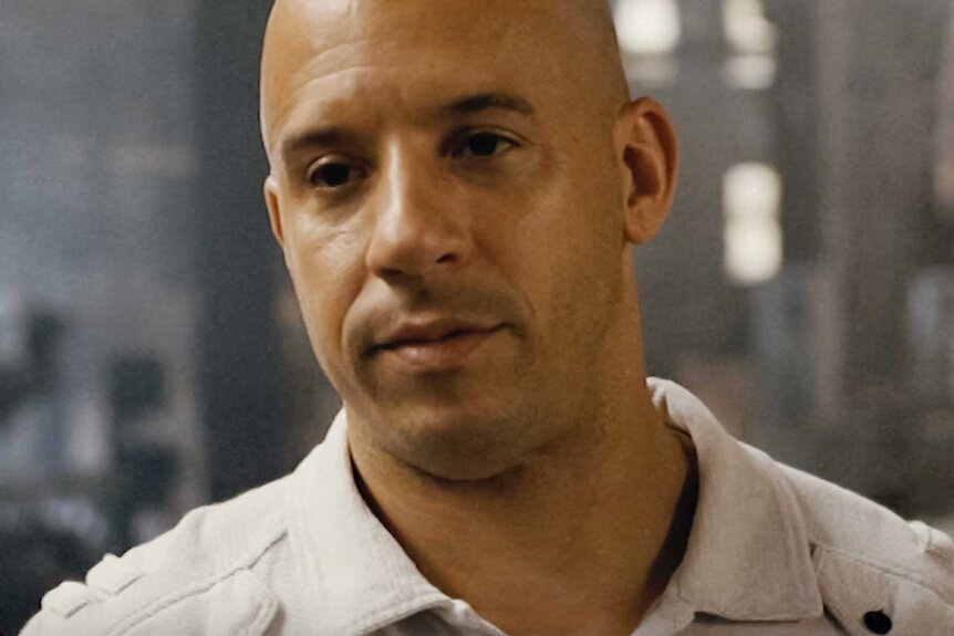 A close up of Dominic Toretto looking off to the side in Fast Five (2011).