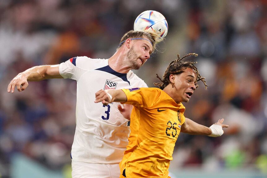 Walker Zimmerman of the United States heads a ball during a FIFA World Cup Qatar 2022.
