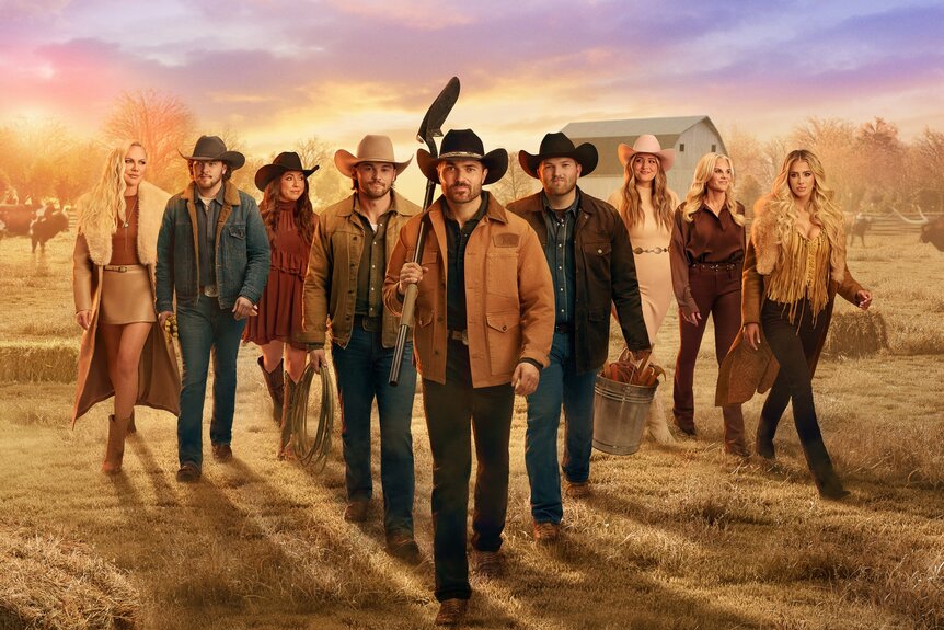 The Full Cast of The McBee Dynasty: Real America Cowboys Season 3 standing in front of a farm field, trees, and dusk skies.