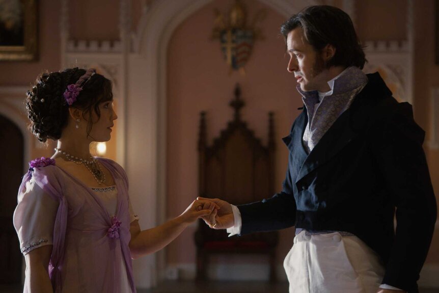 Persephone Lancaster holding hands with Adam Boyce, Duke of Kielder, in Seeking Persephone Season 1.