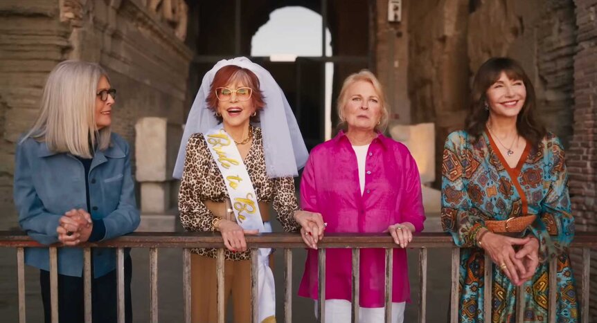 Diane, Vivian, Sharon, and Carol looking over a railing during Book Club: The Next Chapter (2023).