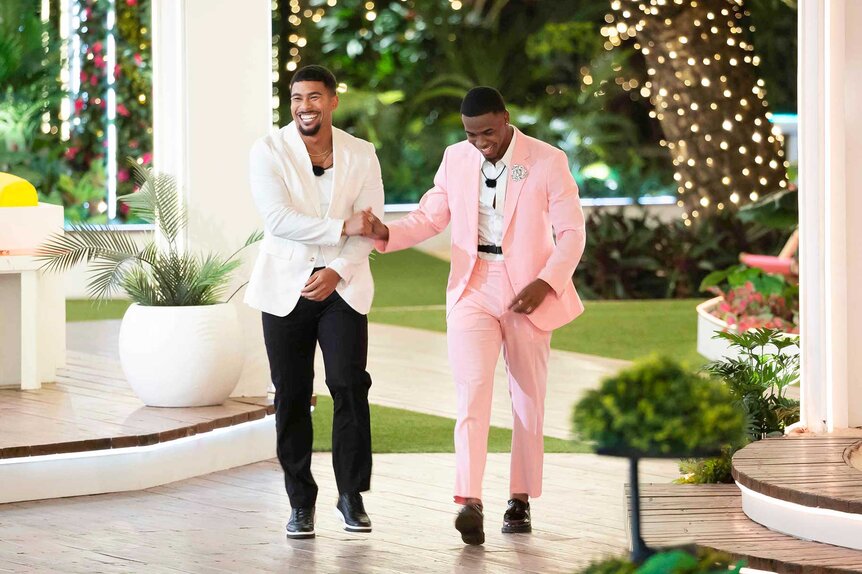 Sean David Reifel and Kuman Dameon Chandler shaking hands on Love Island USA Season 8 Episode 1.
