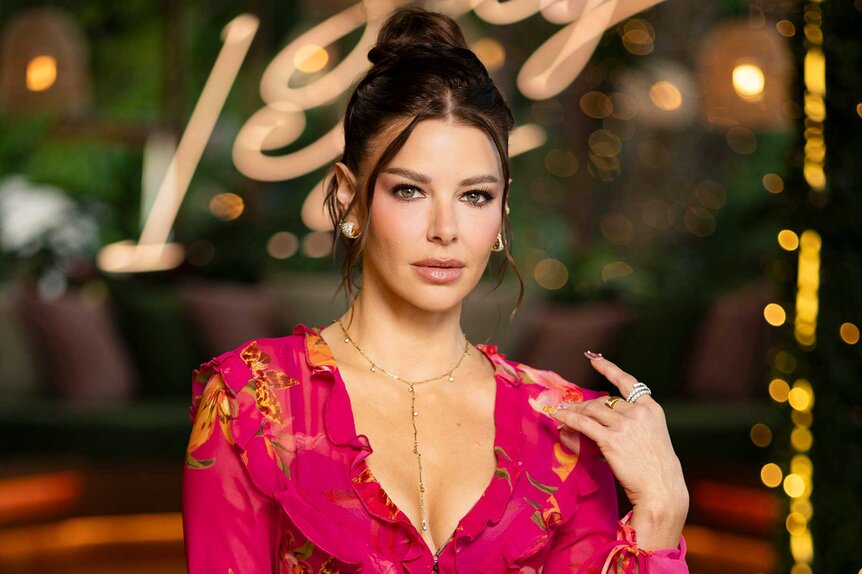 Ariana Madix in a pink dress on Love Island USA Season 8.
