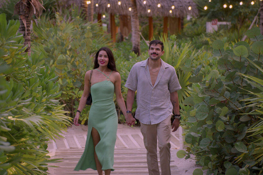 Tori Dahl and Felipe Cruz holding hands and walking in Married at First Sight Season 20 Episode 4.