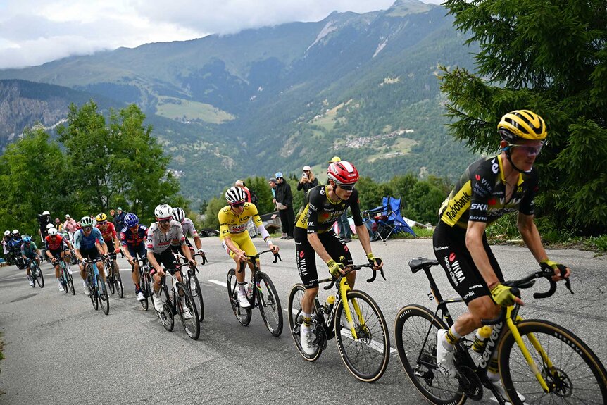 A group of bikers going up the Alps of Southeastern France during the 112th Tour de France.